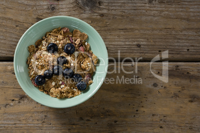 Oats with blueberries forming face