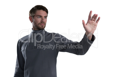 Man pretending to touch an invisible screen