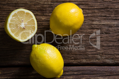 Fresh lemon on wooden table