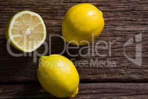 Fresh lemon on wooden table