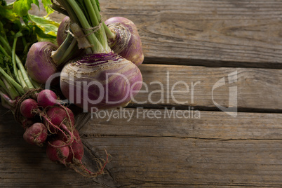 Beetroot and turnip on wooden table