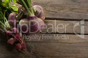Beetroot and turnip on wooden table