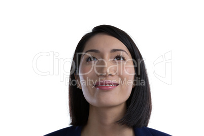 Thoughtful businesswoman against white background