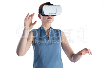 Young businesswoman gesturing while wearing virtual reality glasses