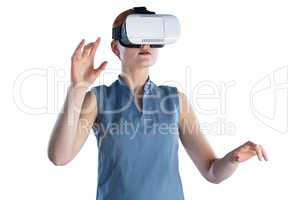 Young businesswoman gesturing while wearing virtual reality glasses