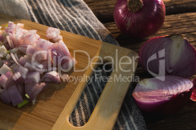 Chopped onion on chopping board