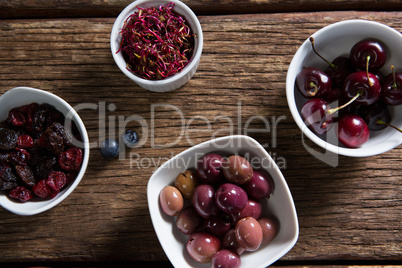 Various fruits and vegetables on wooden table