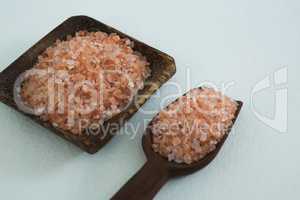 Sea salt in wooden bowl and scoop