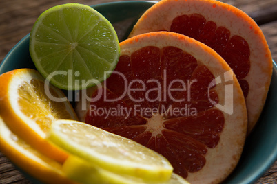 Various citrus slices in bowl