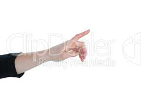 Cropped hand of businesswoman using imaginary interface