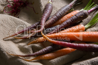 Fresh carrots on napkin
