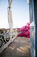 Wedding dress hanging on architectural column