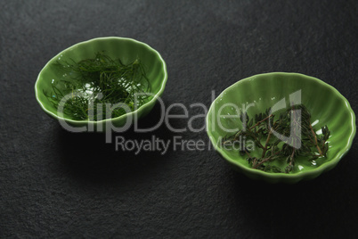Dill and rosemary in bowl