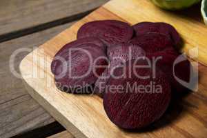 Slice of beetroots on chopping board