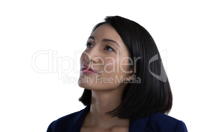 Thoughtful businesswoman against white background