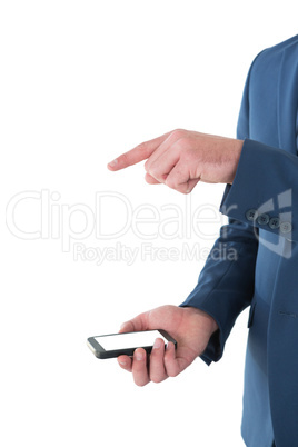 Cropped image of businessman gesturing over mobile phone