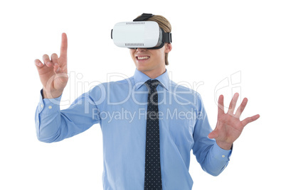 Happy young businessman gesturing while wearing futuristic glasses