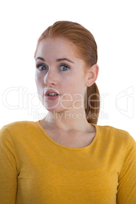 Portrait of shocked businesswoman with redhead