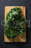 Mustard greens on chopping board