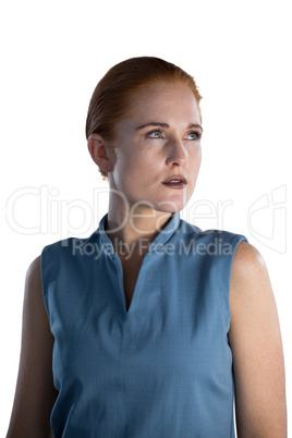 Close up of contemplated businesswoman with gray eyes