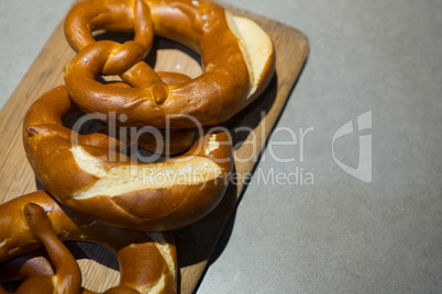 Close-up of pretzels on wooden board
