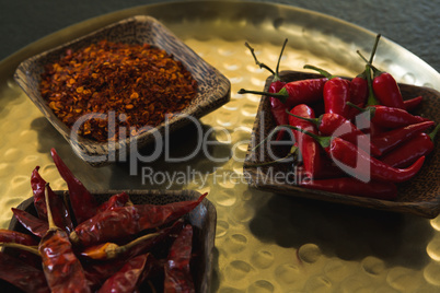 Red Chilies, dried red chili pepper and crushed red pepper in plate