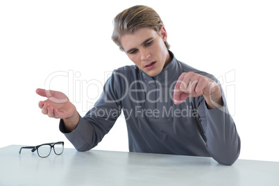 Businessman examining invisible product