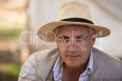 Portrait of confident man wearing hat