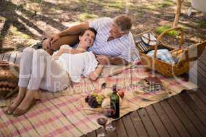 Happy couple relaxing in cottage