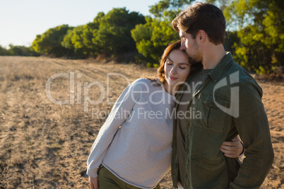 Romantic couple on field