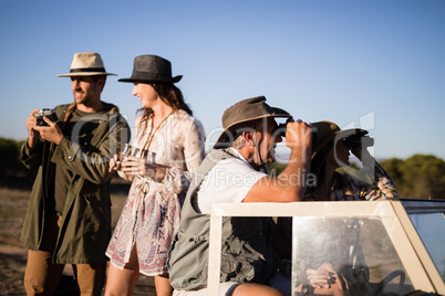 Couple taking picture with camera