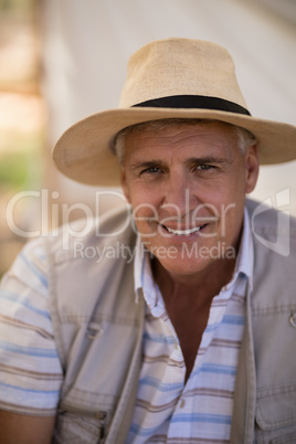 Portrait of happy man wearing hat