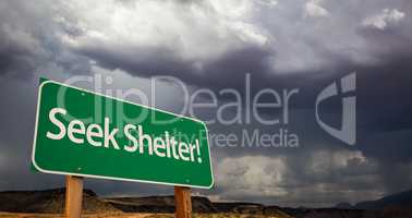 Seek Shelter Green Road Sign and Stormy Clouds