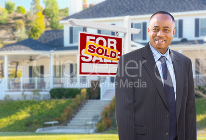 African American Agent In Front of Beautiful Custom House and So