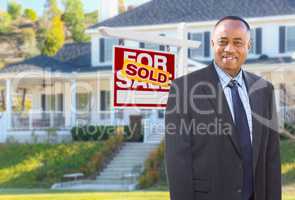 African American Agent In Front of Beautiful Custom House and So