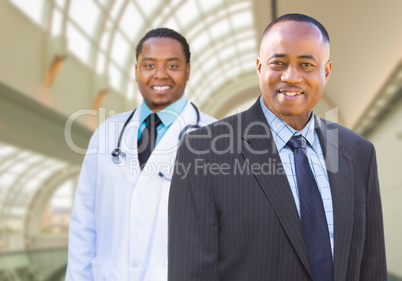 African American Businessman and Doctor Inside Medical Building.