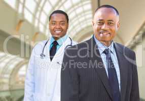 African American Businessman and Doctor Inside Medical Building.