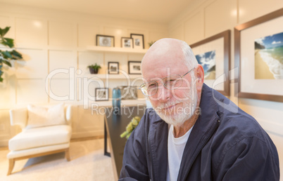 Senior Man Inside His Home Office.