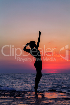 Dance at sunset. Vertical image