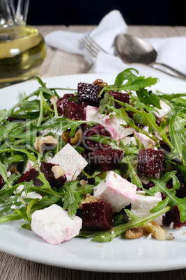 Roasted beets, arugula, cheese feta, and walnuts