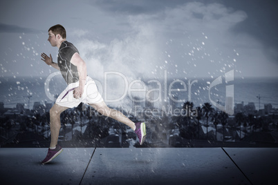 Composite image of muscular rugby player running