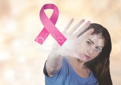 Open hand with pink ribbon for breast cancer awareness