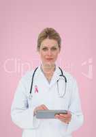 Doctor woman with breast cancer awareness ribbon