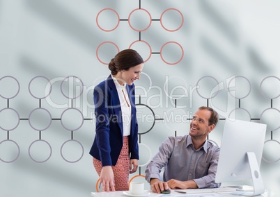 Man and woman meeting with mind map and computer