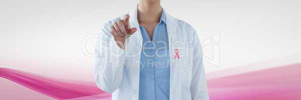 Doctor woman with breast cancer awareness ribbon