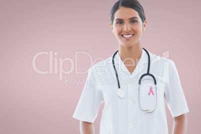 Doctor woman with breast cancer awareness ribbon