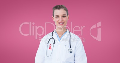 Doctor woman with breast cancer awareness ribbon Doctor woman with breast cancer awareness ribbon