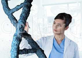 Doctor woman interacting with 3D DNA strand