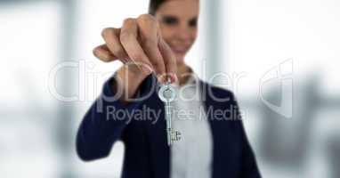 Business woman holding keys