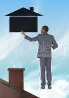 Businessman climbing ladder and reaching home icon over roof